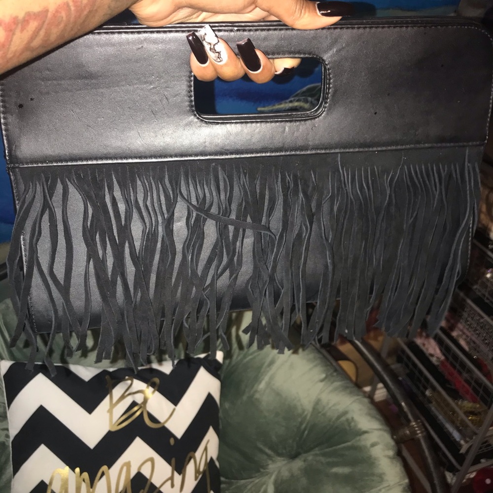 Black fringe clutch